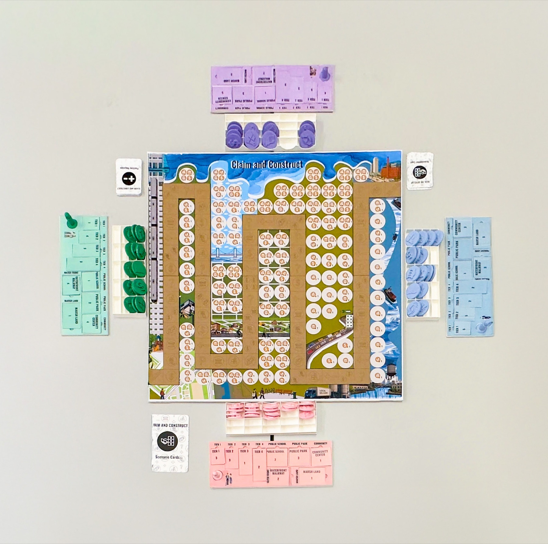 Claim and Construct board game and its pieces arranged as a complete set